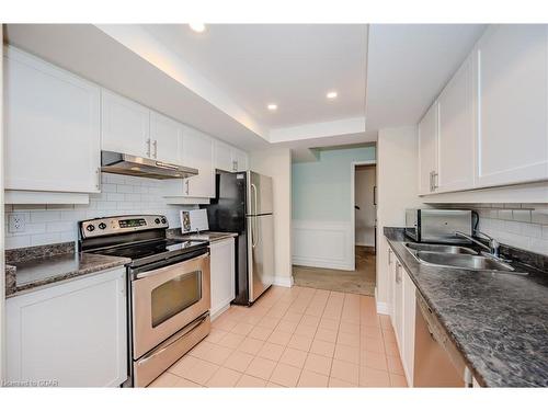 406-55 Kingsbridge Garden Circle, Mississauga, ON - Indoor Photo Showing Kitchen With Double Sink