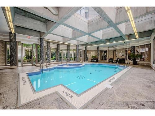 406-55 Kingsbridge Garden Circle, Mississauga, ON -  Photo Showing Other Room With In Ground Pool