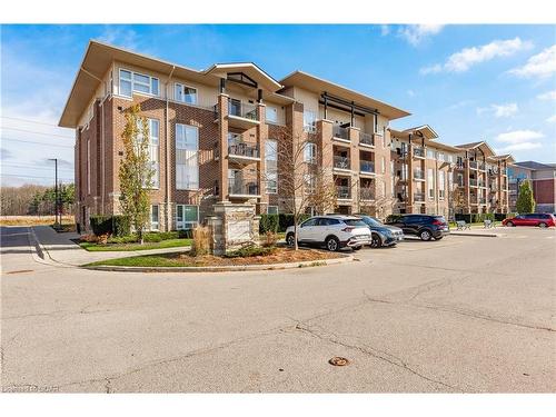 412-45 Kingsbury Square, Guelph, ON - Outdoor With Balcony With Facade