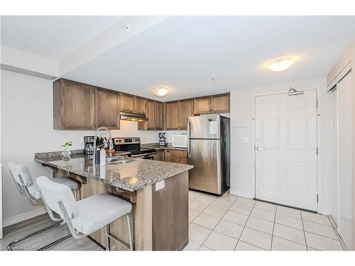 412-45 Kingsbury Square, Guelph, ON - Indoor Photo Showing Kitchen With Double Sink