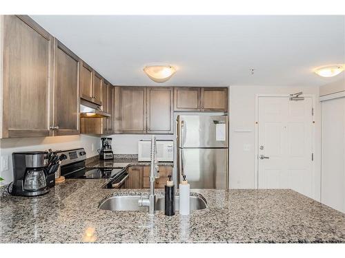 412-45 Kingsbury Square, Guelph, ON - Indoor Photo Showing Kitchen With Double Sink