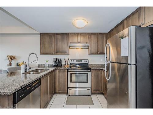 412-45 Kingsbury Square, Guelph, ON - Indoor Photo Showing Kitchen With Double Sink