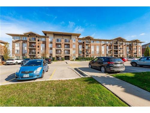 412-45 Kingsbury Square, Guelph, ON - Outdoor With Balcony With Facade