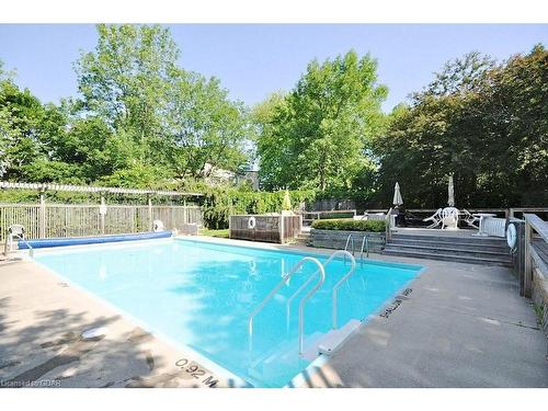 501-89 Westwood Road, Guelph, ON - Outdoor With In Ground Pool With Backyard