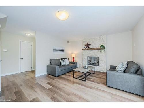 49 Old Colony Trail, Guelph, ON - Indoor Photo Showing Living Room With Fireplace