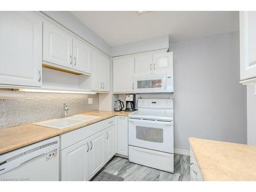 54-3339 Council Ring Road, Mississauga, ON - Indoor Photo Showing Kitchen With Double Sink