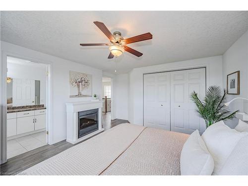 173 Clair Road W, Guelph, ON - Indoor Photo Showing Bedroom With Fireplace