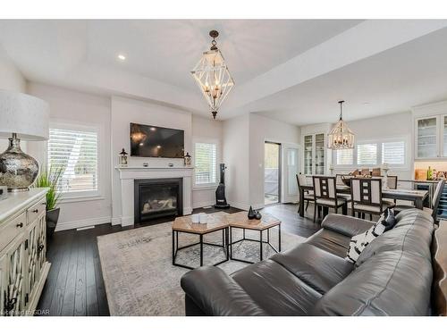 380 Rogers Road, Listowel, ON - Indoor Photo Showing Living Room With Fireplace