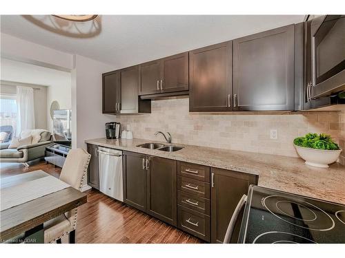 51 Wideman Boulevard, Guelph, ON - Indoor Photo Showing Kitchen With Double Sink