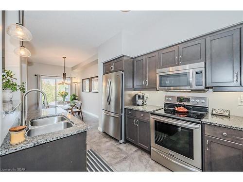 13-146 Downey Road, Guelph, ON - Indoor Photo Showing Kitchen With Stainless Steel Kitchen With Double Sink