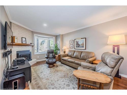 106-121 Waterloo Avenue, Guelph, ON - Indoor Photo Showing Living Room With Fireplace