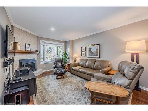 106-121 Waterloo Avenue, Guelph, ON - Indoor Photo Showing Living Room With Fireplace