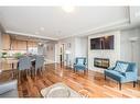 901-150 Wellington Street E, Guelph, ON  - Indoor Photo Showing Living Room With Fireplace 