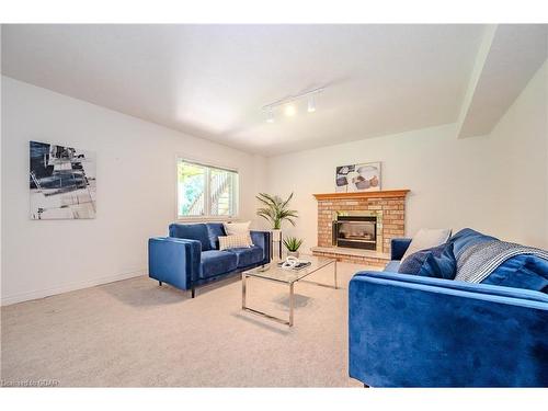 7 Whitetail Court, Guelph, ON - Indoor Photo Showing Living Room With Fireplace