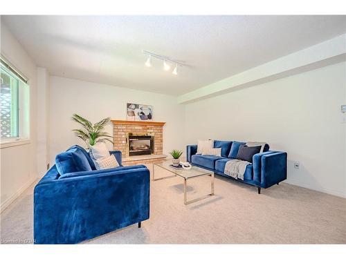 7 Whitetail Court, Guelph, ON - Indoor Photo Showing Living Room With Fireplace