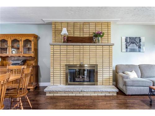 692 Speedvale Avenue E, Guelph/Eramosa, ON - Indoor Photo Showing Living Room With Fireplace