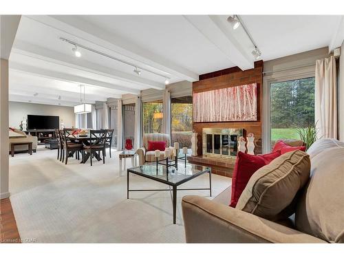 7011 Concession 4, Puslinch, ON - Indoor Photo Showing Living Room With Fireplace