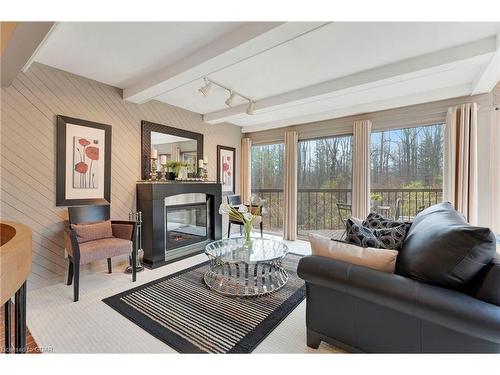 7011 Concession 4, Puslinch, ON - Indoor Photo Showing Living Room With Fireplace