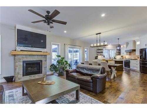 211721 Baseline, West Grey, ON - Indoor Photo Showing Living Room With Fireplace