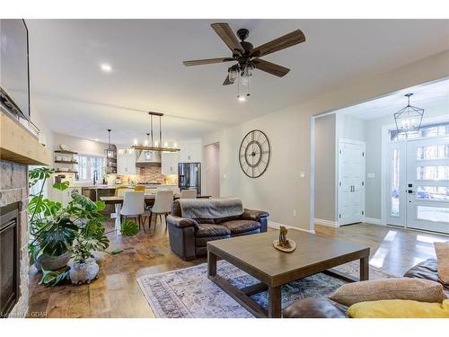 211721 Baseline, West Grey, ON - Indoor Photo Showing Living Room With Fireplace