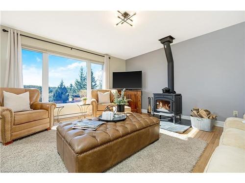 13416 Fourth Line Nassagaweya, Nassagaweya, ON - Indoor Photo Showing Living Room With Fireplace