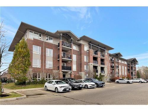 306-41 Goodwin Drive, Guelph, ON - Outdoor With Balcony With Facade