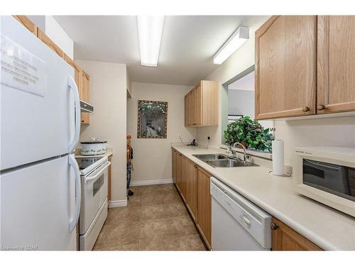 404-20 St George Street, Kitchener, ON - Indoor Photo Showing Kitchen With Double Sink