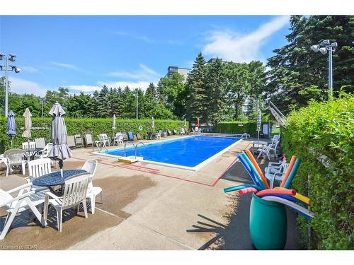 816-19 Woodlawn Road E, Guelph, ON - Outdoor With In Ground Pool With Backyard