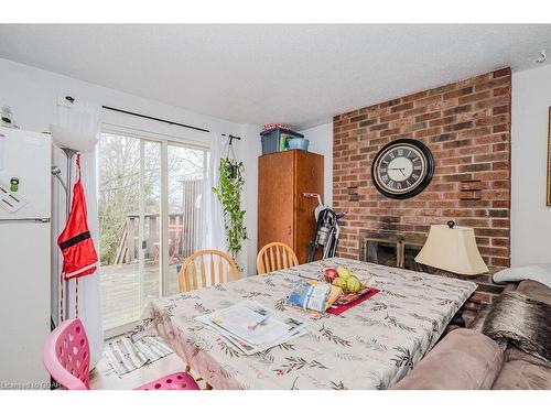 748 Scottsdale Dr Drive, Guelph, ON - Indoor Photo Showing Dining Room With Fireplace