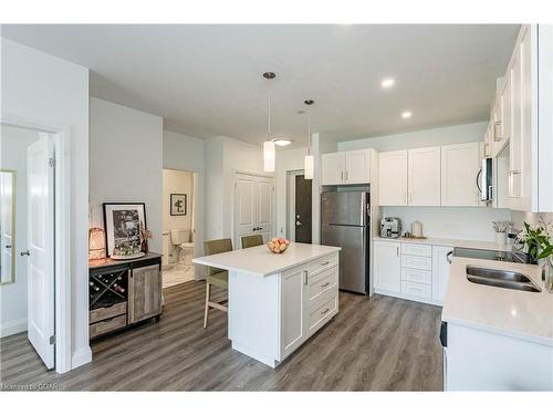 203-332 Gosling Gardens, Guelph, ON - Indoor Photo Showing Kitchen With Double Sink