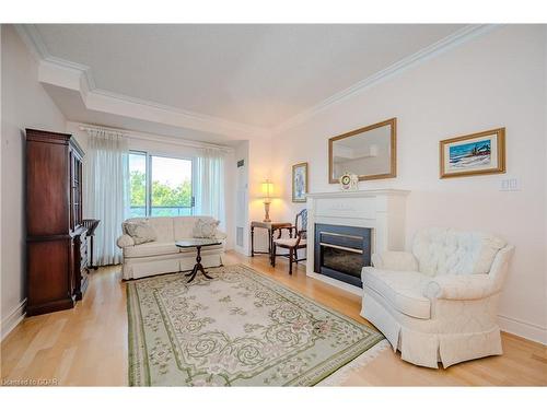 705-1 Lomond Drive, Etobicoke, ON - Indoor Photo Showing Living Room With Fireplace