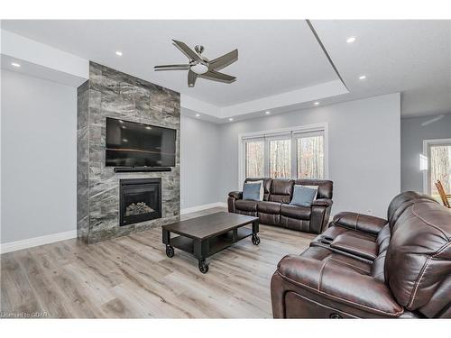 129 Ruth Anne Place, Moorefield, ON - Indoor Photo Showing Living Room With Fireplace