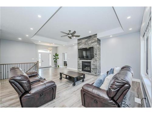 129 Ruth Anne Place, Moorefield, ON - Indoor Photo Showing Living Room With Fireplace