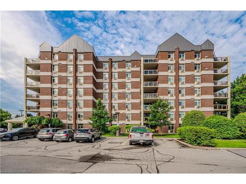 207-8 Christopher Court, Guelph, ON - Outdoor With Balcony With Facade