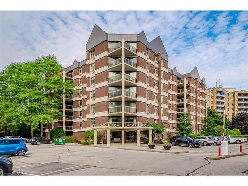 207-8 Christopher Court, Guelph, ON - Outdoor With Balcony With Facade