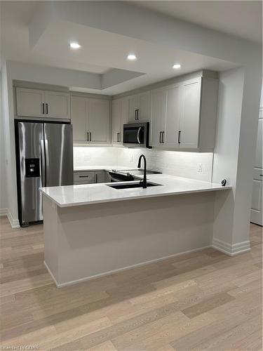 1001-1880 Gordon Street, Guelph, ON - Indoor Photo Showing Kitchen With Stainless Steel Kitchen With Double Sink