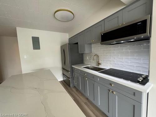 303-91 Conroy Crescent, Guelph, ON - Indoor Photo Showing Kitchen With Double Sink With Upgraded Kitchen