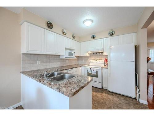 81 Windflower Drive, Kitchener, ON - Indoor Photo Showing Kitchen With Double Sink