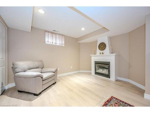 81 Windflower Drive, Kitchener, ON - Indoor Photo Showing Living Room With Fireplace