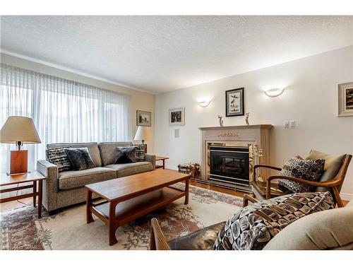 82 White Pine Way, Guelph, ON - Indoor Photo Showing Living Room With Fireplace