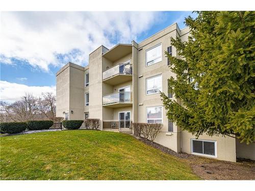 102-245 Queen Street West, Fergus, ON - Outdoor With Balcony