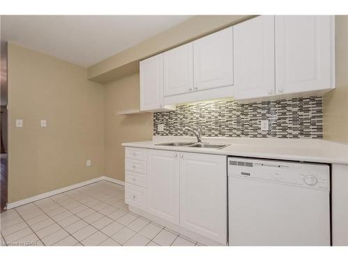 102-245 Queen Street West, Fergus, ON - Indoor Photo Showing Kitchen With Double Sink