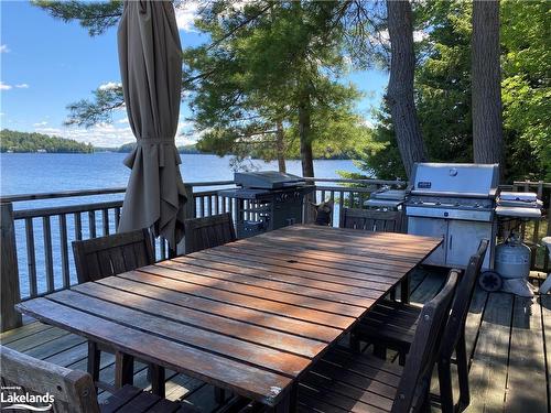 12 Ouno Island, Muskoka Lakes, ON - Outdoor With Body Of Water With Deck Patio Veranda With Exterior