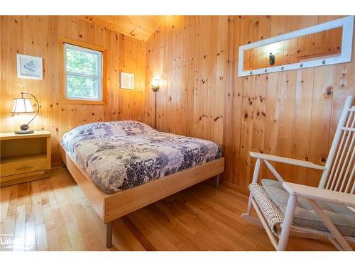 12 Ouno Island, Muskoka Lakes, ON - Indoor Photo Showing Bedroom