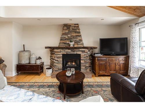 2059 Upper Big Chute Road, Coldwater, ON - Indoor Photo Showing Living Room With Fireplace