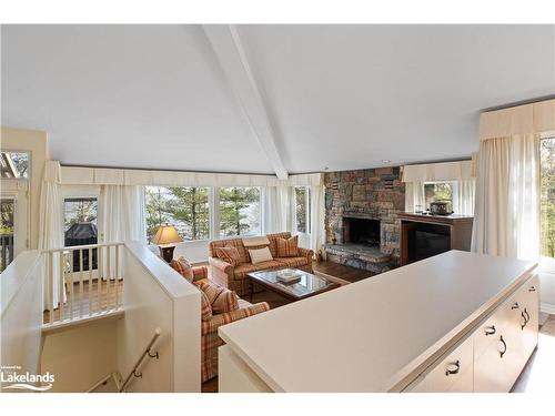 1250 Waldmere Road, Bracebridge, ON - Indoor Photo Showing Living Room With Fireplace