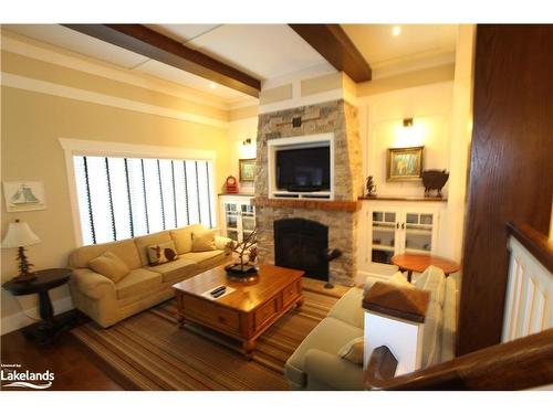 V10 W5-1020 Birch Glen Road, Baysville, ON - Indoor Photo Showing Living Room With Fireplace