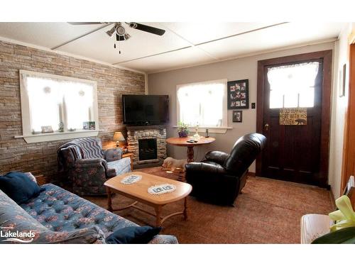 4352 124 County Road, Clearview, ON - Indoor Photo Showing Living Room With Fireplace