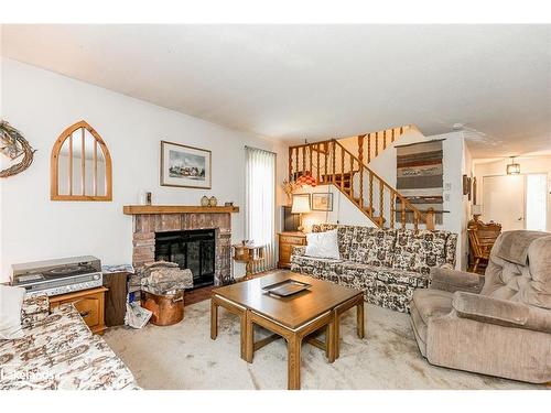 147 Escarpment Crescent, Collingwood, ON - Indoor Photo Showing Living Room With Fireplace