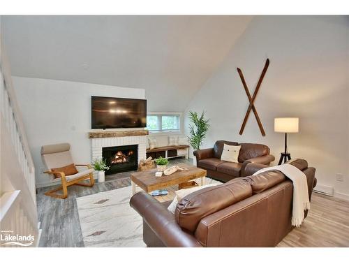 207 Escarpment Crescent, Collingwood, ON - Indoor Photo Showing Living Room With Fireplace